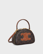 Half Moon Handbag in Triomphe Canvas and Calfskin